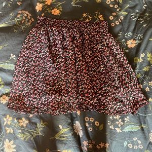Women’s floral mini skirt . Size M
